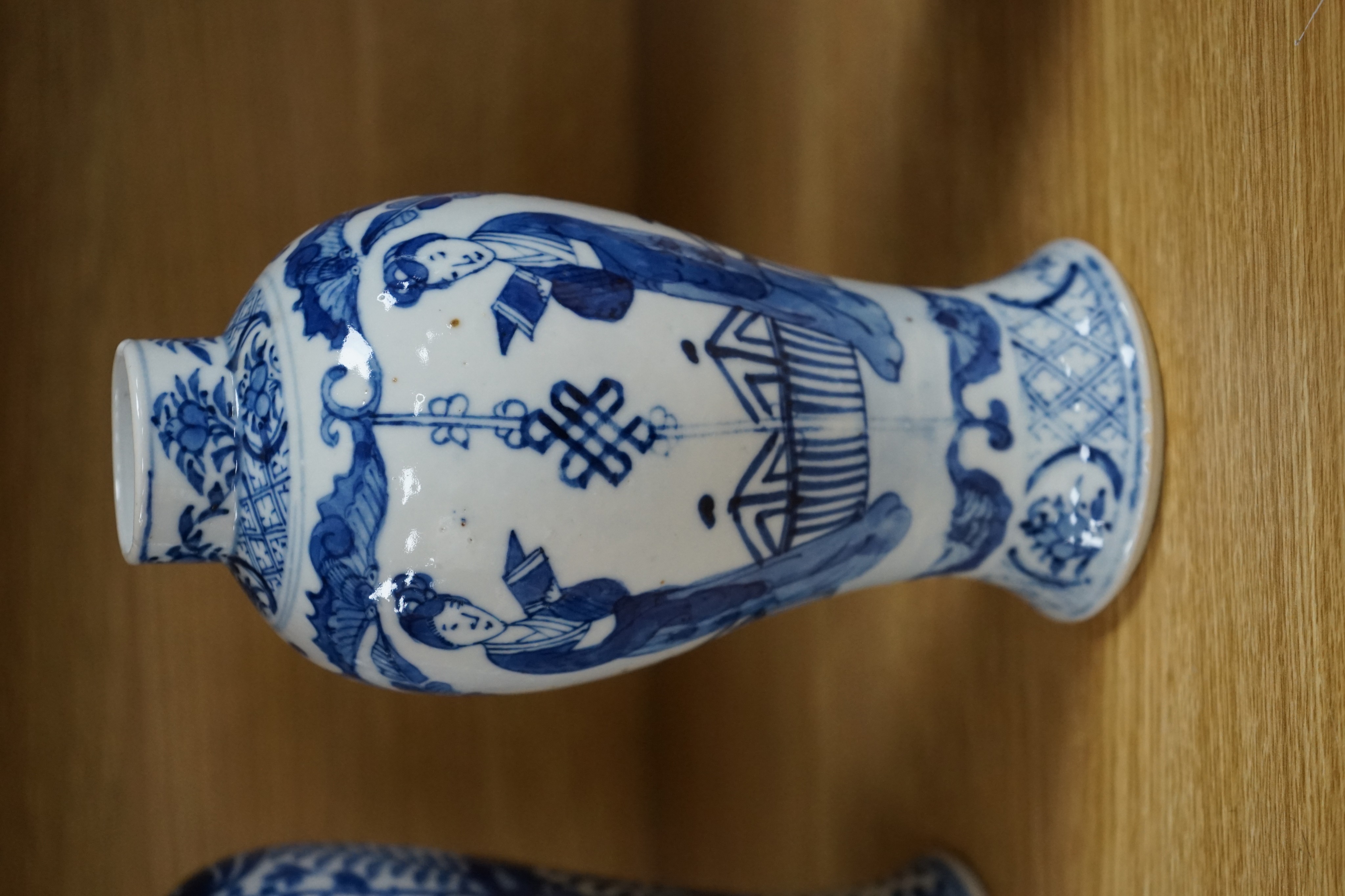Two Chinese blue and white baluster vases, late 19th century and a Chinese sang de boeuf glazed vase, 27cm